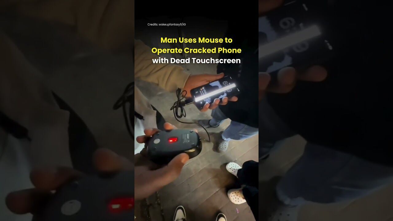 Man Uses Mouse to Operate Cracked Phone with Dead Touchscreen