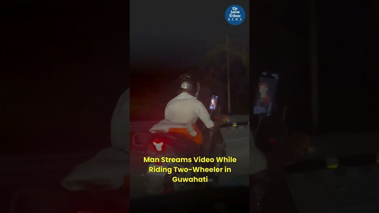 Man Streams Video While Riding Two Wheeler in Guwahati