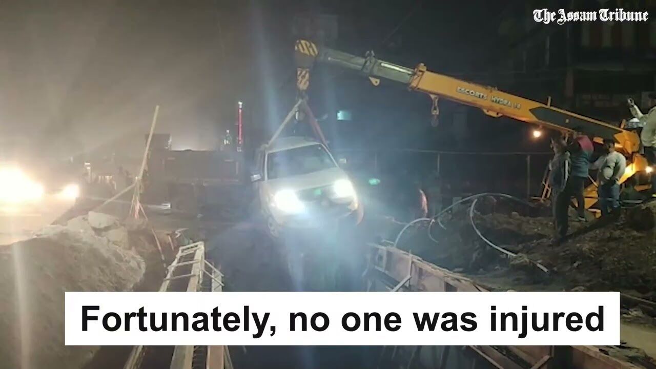 Guwahati:  SUV falls into under construction drain in Bashistha Chariali