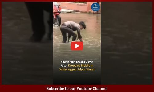 Young Man Breaks Down After he Drops mobile in Waterlogged Streets in Jaipur